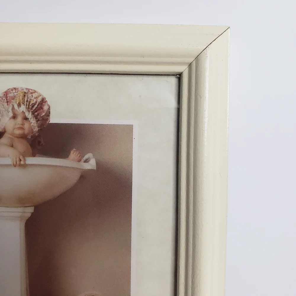 Framed print of Anne Geddes' 
